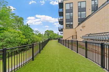 The outdoor gated pet run at Lilia Apartments in Lilydale, MN 55118